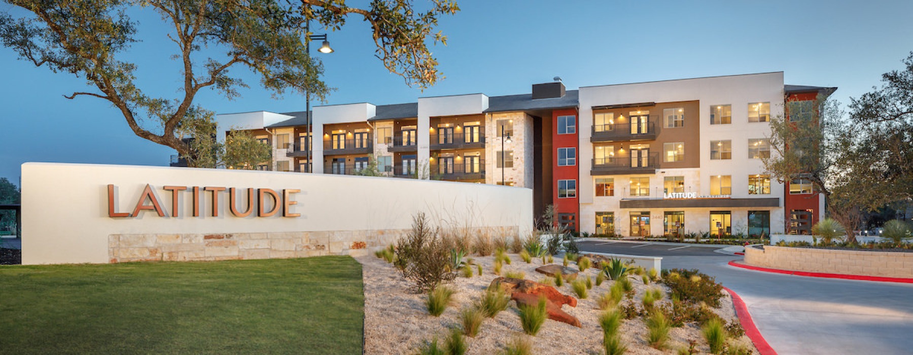 sign at an entrance to a large building