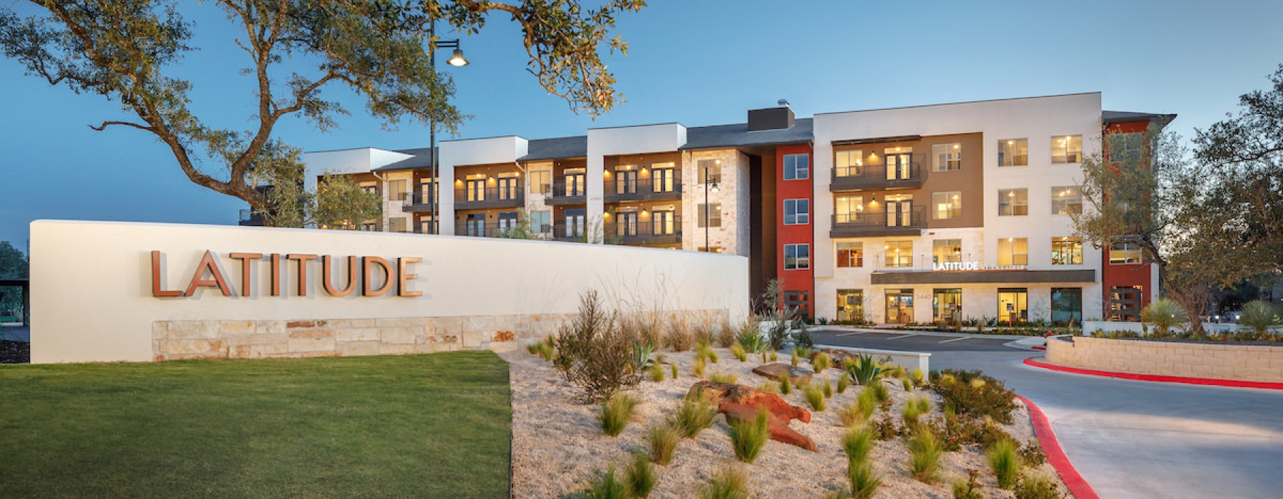 sign at an entrance to a large building