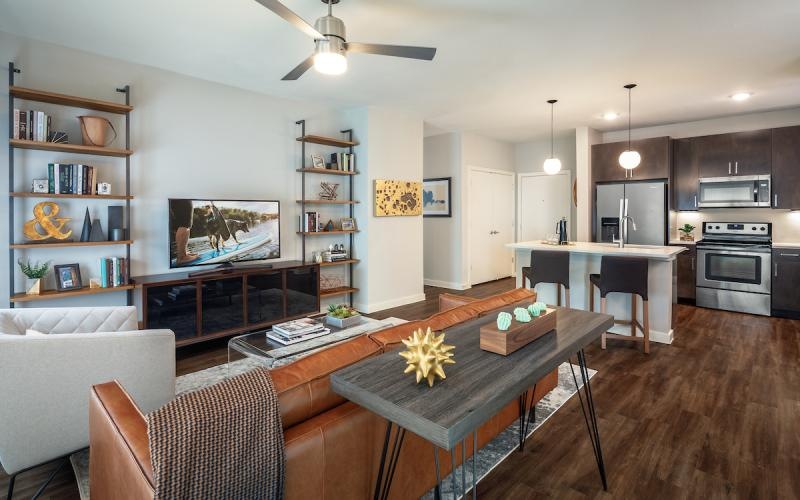 a living room with a couch and a tv